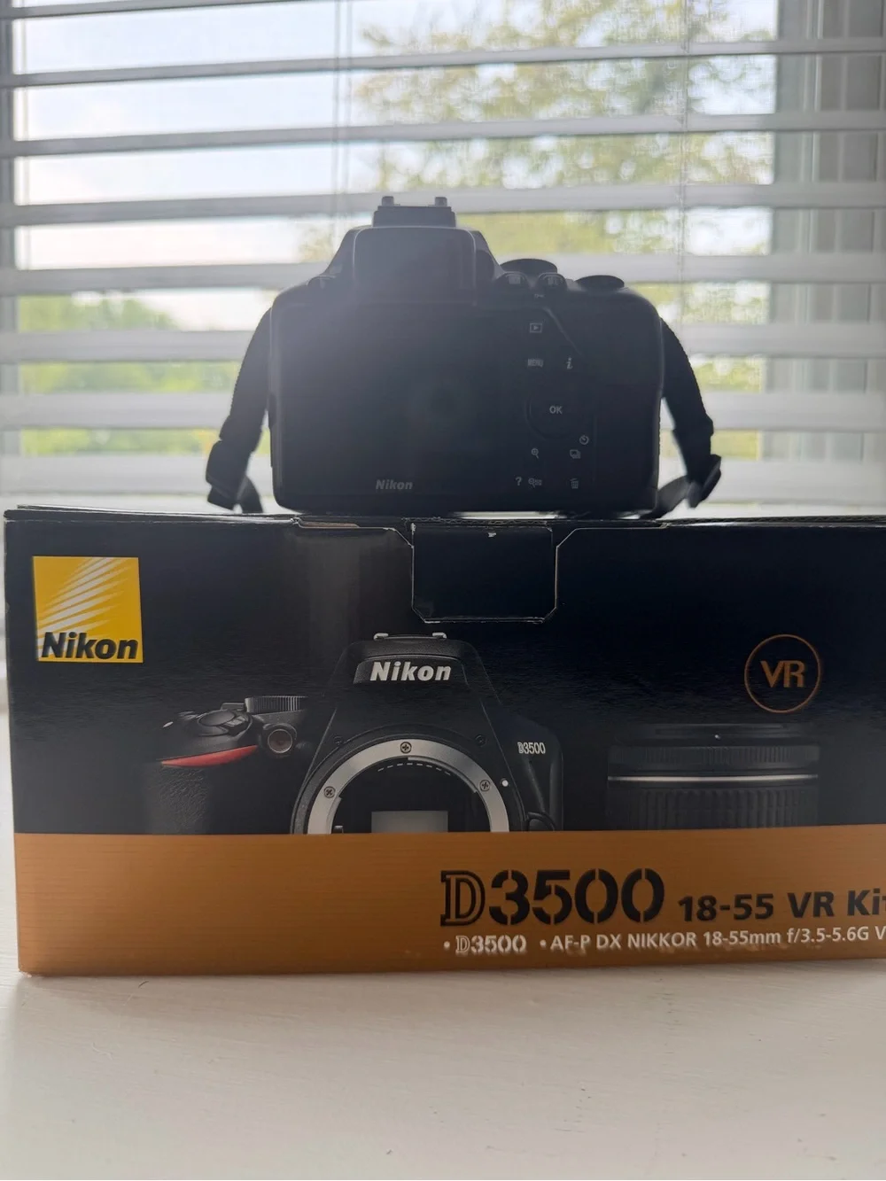 Nikon D3500 DSLR Camera Kit in Black with Orange Accent